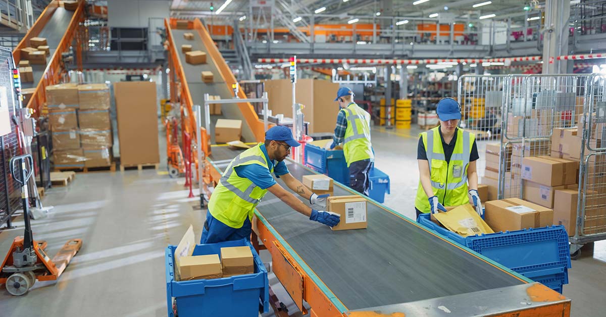 workers sorting warehouse returns