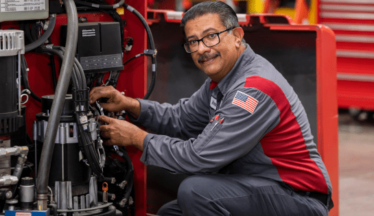 Service Tech working on forklift